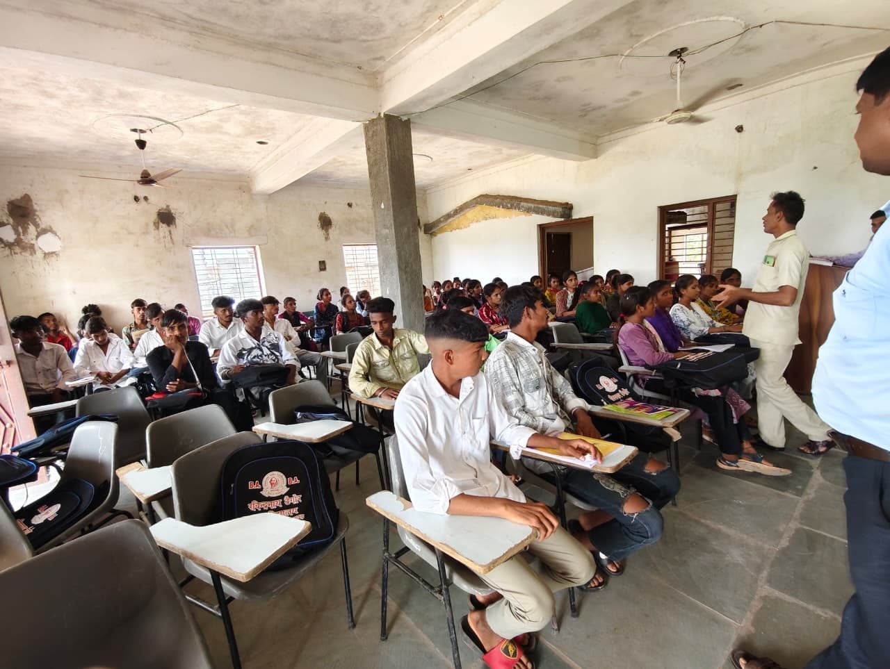 Lecturer teaching a full classroom